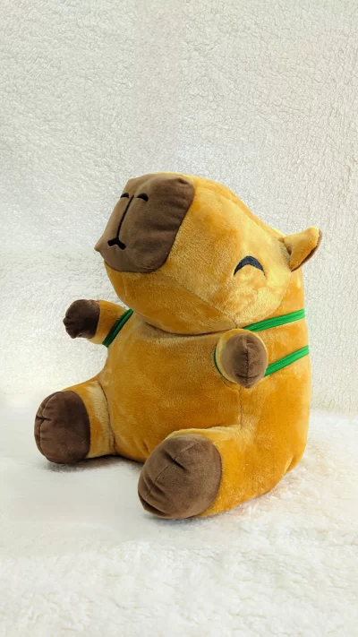 Peluche capibara c/ manta